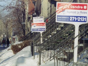 The benchmark price for a home fell 1.4 per cent on a seasonally-adjusted basis to $744,000 in November, the Canadian Real Estate Association said Thursday.