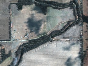 A satellite image shows emergency crews working to clean up the crude oil spill along Mill Creek following the leak at the Keystone pipeline operated by TC Energy in Kansas.
