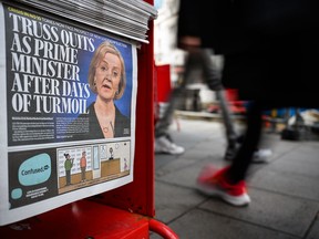 The front page of a London-based newspaper announces the resignation of Prime Minister Liz Truss on Oct. 20, 2022. Her mini-budget saw the GBP fall to its lowest-ever level against the dollar, increasing mortgage interest rates and deepening the cost-of-living crisis.