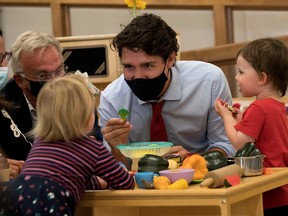 Prime Minister Justin Trudeau playing with children at the daycare in Carrefour de l'Isle-Saint-Jean school in Charlottetown, Prince Edward Island.