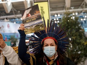 Indigenous activists protest in front of the Canada Pavilion against Belo Sun Mining Corp. at United Nations Biodiversity Conference (COP15) in Montreal.