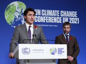 Prime Minister Justin Trudeau and Minister of Environment and Climate Change Steven Guilbeault hold a press conference at COP26 in Glasgow, Scotland on Nov. 2, 2021.
