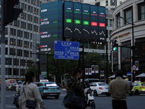 A giant display of stock indexes, following the COVID-19 outbreak, in Shanghai, China.