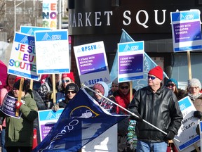 Protestors from CUPE and other local unions took to the streets to rally against Doug Ford's Bill 28.
