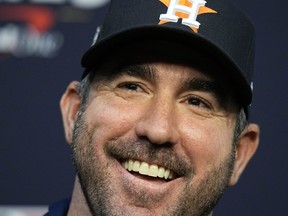 FILE - Houston Astros starting pitcher Justin Verlander speaks to media ahead of Game 1 of the baseball World Series between the Houston Astros and the Philadelphia Phillies on Thursday, Oct. 27, 2022, in Houston. Justin Verlander agreed to an $86.7 million, two-year contract with the New York Mets on Monday, Dec. 5, 2022, reuniting the AL Cy Young Award winner with Max Scherzer and giving the Mets a high-profile replacement for Jacob deGrom.