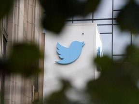 FILE - A sign at Twitter headquarters is shown in San Francisco, Thursday, Dec. 8, 2022. Twitter has suspended an account that used publicly available flight data to track Elon Musk's private jet, despite a pledge by the social media platform's new owner to keep it up because of his free speech principles.