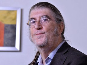 FILE - Philip H. Dybvig poses for a photographer at a hotel in Boston after winning the 2022 Nobel Prize for Economics on Oct. 10, 2022. Washington University in St. Louis is investigating Dybvig over sexual harassment allegations that his attorney dismisses as
