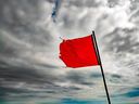 Investors can take some steps to protect their portfolios by looking out for red flags before buying a stock.