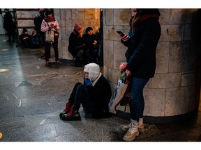 Civilians take shelter inside a metro station during an air raid alert in the centre of Kyiv on December 16. Photographer: Dimitar Dilkoff/AFP/Getty Images