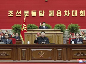 FILE - In this photo provided by the North Korean government, North Korean leader Kim Jong Un, bottom center, attends a ruling party congress in Pyongyang, North Korea, on Jan. 12, 2021. North Korean hackers have stolen an estimated 1.5 trillion won ($1.2 billion) in cryptocurrency and other virtual assets in the past five years, more than half of it this year alone, South Korea's spy agency said Thursday, Dec. 2022.