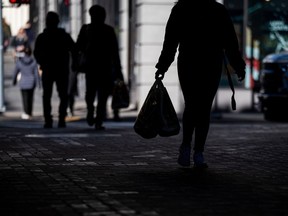 A shopper on Powell Street in San Francisco, California, US, on Tuesday, Nov, 29, 2022. US retailers eked out modest growth over Black Friday weekend with deep discounts that lured shoppers seeking a reprieve from stubborn inflation.