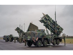 Ready-for-combat "Patriot" anti-aircraft missile systems of the Bundeswehr's anti-aircraft missile squadron 1 stand on the airfield of Schwesing military airport on March 17, 2022. Photographer: Axel Heimken/picture alliance/Getty Images