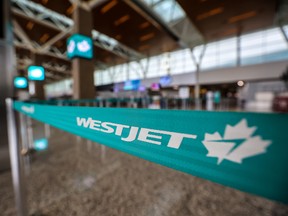 A WestJet check-in area at the Calgary International Airport.
