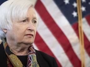 FILE - Treasury Secretary Janet Yellen speaks with reporters during a visit to the Virginia Innovation Partnership Corporation incubator at the Center for Innovative Technology campus in Herndon, Va., Oct. 21, 2022. Set to unveil the first U.S. banknotes bearing the signature of a female Treasury Secretary, Yellen will denote a new milestone in American history Thursday.