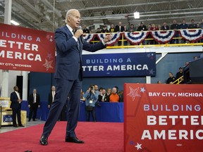 FILE - President Joe Biden speaks about manufacturing jobs and the economy at SK Siltron CSS, a computer chip factory in Bay City, Mich., Nov. 29, 2022. Biden is traveling to Arizona on Tuesday, Dec. 6.