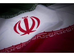 The Iranian flag is arranged for a photograph in New York, U.S., on Wednesday, Feb. 19, 2014.  Photographer: Scott Eells/Bloomberg