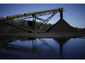Metallurgical coal dumped onto a pile in Ceredo, West Virginia. Photographer: Luke Sharrett/Bloomberg