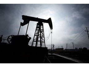 A pumpjack is silhouetted as it operates in Baku, Azerbaijan, on Sunday, March 18, 2018. Two years after descending into junk, Azerbaijan's shortest path to winning back its investment grade is by rebuilding the stash of petrodollars it raided during a recession and a banking meltdown, according to Fitch Ratings. Photograph: Taylor Weidman/Bloomberg Photographer: Taylor Weidman/Bloomberg