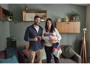Ardern and partner Clarke Gayford pose with their baby daughter Neve Gayford in 2018.
