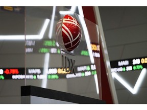 Signage is displayed inside the Indonesia Stock Exchange (IDX) in Jakarta, Indonesia, on Thursday, April 18, 2019. With Indonesian President Joko Widodo on course to win a second term as leader, the political uncertainty that's weighed on the economy this year will be lifted. Photographer: Dimas Ardian/Bloomberg