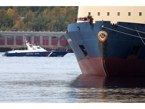 The Admiral Makarov icebreaking ship, right, operated by Fesco Transportation Group (FESCO), sits moored at the dockside at the Port of Murmansk, in Murmansk, Russia, on Saturday, Sept. 14, 2019. Crude and condensate shipments from Russia's Arctic terminals are shipped in dedicated shuttle tankers to the Russian port of Murmansk where they are trans-shipped onto larger vessels for export.
