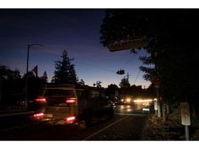 Traffic stops at an intersection during a blackout in Calistoga, California, U.S., on Thursday, Oct. 24, 2019. In a deliberate blackout designed to keep power lines from igniting wildfires, PG&E Corp. and other utilities have cut service to nearly 200,000 homes and business in shutoffs that could eventually affect 1.5 million people as wind storms threaten to knock down power lines. Photographer: David Paul Morris/Bloomberg