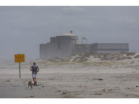 The Koeberg nuclear power station, operated by Eskom Holdings SOC Ltd., viewed from Melkbosstrand beach in Cape Town, South Africa, on Wednesday, Nov. 25, 2020. The decision to begin installing new steam generators at the Koeberg plant near Cape Town underscores state-owned Eskom's confidence that it will win approval to prolong production of low-emissions nuclear power into the middle of the century.