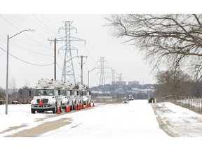 Pike Electric service trucks line up after a snow storm on February 16, 2021 in Fort Worth, Texas.  Photographer: Ron Jenkins/Getty Images North America