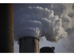 Emissions rise from the Kentucky Utilities Co. Ghent generating station in Ghent, Kentucky, U.S., on Tuesday, April 6, 2021. Coal's slow downfall is gaining momentum across the U.S. as clean energy becomes cheaper and wins widespread support, but lawmakers in mining states from Wyoming to West Virginia are determined to fight back with a series of roadblocks to President Joe Biden's plan to cut greenhouse-gas emissions.
