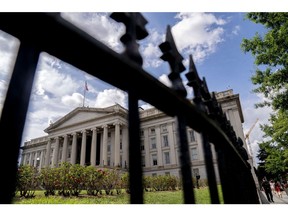 The U.S. Treasury Department building in Washington, D.C., U.S., on Saturday, June 26, 2021. The Federal Reserve might consider an interest-rate hike from near zero as soon as late 2022 as the labor market reaches full employment and inflation is at the central bank's goal.