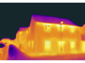 Residential homes, taken with a heat-sensing camera showing higher amounts of heat emitted in the brighter parts, in Bracknell, U.K., on Monday, Dec. 6, 2021. U.K. households, already bracing for their energy bills to rise by "several hundred pounds," will see a further jump following the collapse of Bulb Energy Ltd. and other suppliers, the regulator said. Photographer: Jason Alden/Bloomberg