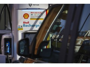 A recharging point at a Shell Recharge electric vehicle charging hub, operated by Royal Dutch Shell Plc, after re-opening to the public following a replacement of petrol and diesel pumps, in London, U.K., on Thursday, Jan. 13, 2022. The U.K. has banned the sale of new petrol and diesel cars from 2030, which will require a swift build out of the charging network.