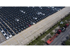 Tesla vehicles waiting for shipping transport in a large lot near the Waigaoqiao Container Port in Shanghai, China, on Friday, June 3, 2022. China's financial capital reported its fewest Covid-19 cases in three months as residents celebrated an end to mandatory home isolation for most of the city, while some companies continued factory restrictions out of caution. Photographer: Qilai Shen/Bloomberg