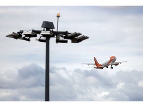 A passenger aircraft, operated by EasyJet Plc, taking off at London Luton Airport in Luton, U.K., on Monday, July 25, 2022. EasyJet are due to report their latest earnings on Tuesday. Photographer: Chris Ratcliffe/Bloomberg