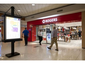 A Rogers store in the Capilano Mall in North Vancouver, British Columbia, Canada, on Tuesday, Sept. 6, 2022. Rogers Communications Inc. is still waiting to see if it can win regulatory approval for a takeover of a smaller Canadian cable company, 17 months after it was first announced. Photographer: Taehoon Kim/Bloomberg