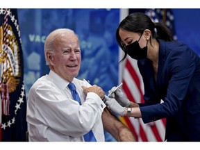 US President Joe Biden receives a booster dose of the Covid-19 vaccine targeting the Omicron BA.4/BA.5 subvariants in the Eisenhower Executive Office Building in Washington, DC, US, on Tuesday, Oct. 25, 2022. The White House is asking businesses to help employees get updated coronavirus vaccines by hosting on-site clinics and will initiate a new program providing some Americans with free home delivery of Covid-19 treatments before an expected surge of the virus this fall.