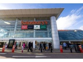 Customers enter a J Sainsbury Plc supermarket in Colney, UK, on Monday, Oct. 31, 2022. Sainsbury's are due to report their latest earnings on Nov. 3.