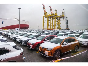 VinFast LLC's VF8 electric vehicles bound for shipment at a port in Haiphong, Vietnam, on Friday, Nov. 25, 2022. VinFast, which said in July that it had signed agreements with banks to raise at least $4 billion to help its US expansion, has about 73,000 global reservations for its EVs, according to the company. It has secured about $1.2 billion in incentives for its planned EV factory in North Carolina, where it intends to start production in 2024, according to the auto manufacturer.