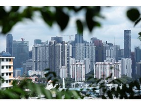 Residential buildings in Singapore, on Tuesday, Jan. 3, 2023. Singapore's recovery held up in 2022, with a relatively strong year-end performance shoring up the economy ahead of an expected global slowdown this year.