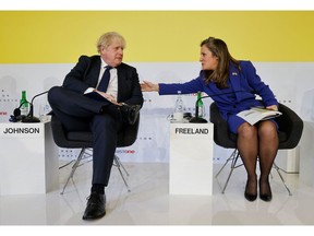 Boris Johnson and Chrystia Freeland during an event in Davos on Jan. 19.