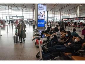 Travelers at Beijing airport on Jan. 14. Domestic travel is expected to rebound faster than international.