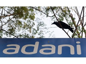 Signage of Adani Group in Mumbai, India, on Friday, Jan. 27, 2023. Shares of Adani Group's companies have lost more than $30 billion in market value in less than two sessions, as a selloff sparked by US short seller Hindenburg Research's scathing report deepened on Friday. Photographer: Indranil Aditya/Bloomberg
