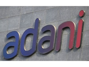 Signage of Adani Group in Mumbai, India, on Friday, Jan. 27, 2023. Shares of Adani Group's companies have lost more than $30 billion in market value in less than two sessions, as a selloff sparked by US short seller Hindenburg Research's scathing report deepened on Friday. Photographer: Indranil Aditya/Bloomberg