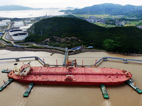 Crude oil tanker being unloaded