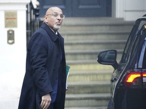 Britain's Conservative Party Chairman Nadhim Zahawi arrives at the Conservative Party head office in Westminster, central London, Monday, Jan. 23, 2023. The chairman of Britain's governing Conservative Party was under pressure to resign on Monday over allegations he settled a multimillion-dollar unpaid tax bill while he was in charge of the country's Treasury.