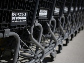 Shopping carts stand lined up in front of a Bed Bath & Beyond Inc. store in Fort Lauderdale, Florida.