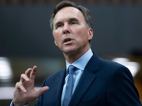 Bill Morneau speaks in the House of Commons in 2020 when he was minister of finance. Morneau criticizes the Trudeau government's COVID-19 aid policy in his upcoming book.