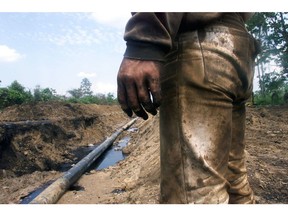 An engineer looks over a repaired oil pipeline in Arauca, Colombia.