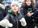 Climate activist Greta Thunberg gestures as she walks outside during the World Economic Forum in Davos, Switzerland.