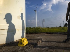 Workers from EKI Energy Services Ltd. at a ReGen Powertech Pvt. wind farm in Dewas, Madhya Pradesh, India, on Friday, Sept. 9, 2022.
